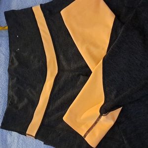 Neon orange and black leggings with pockets